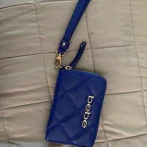 Bebe royal blue clutch wristlet with gold tone hardware